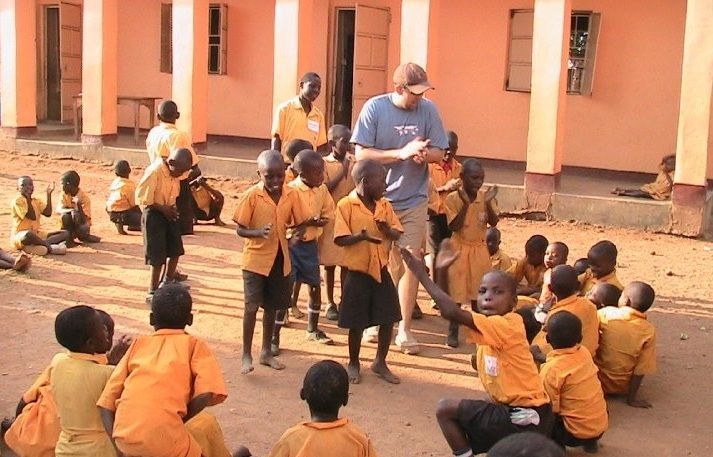 David Anderson volunteers in Uganda David volunteering with children in Uganda for the Village of Eden - Photo via David Anderson